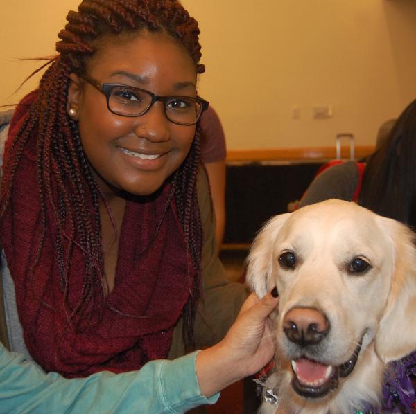 Oakley with student at Oct 2016 Paws for Stress